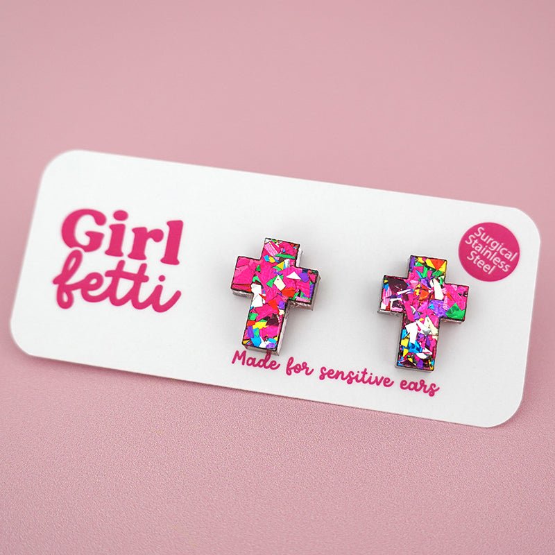 Cross stud earring made from pink rainbow glitter acrylic