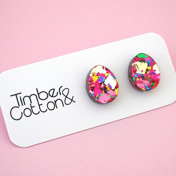 Handmade Easter egg stud earrings in a pink rainbow flake glitter acrylic