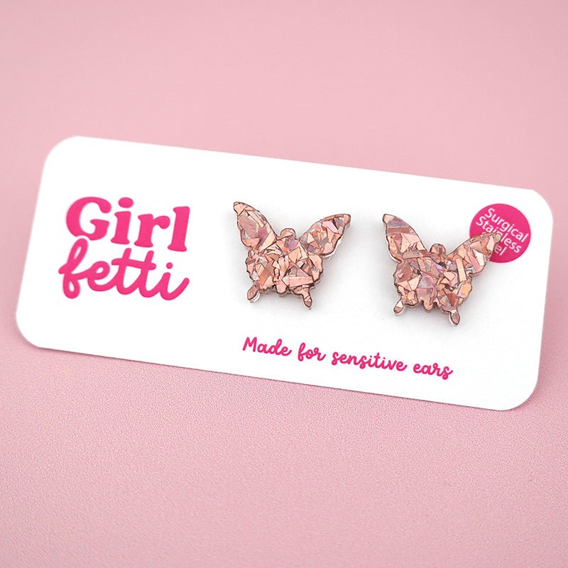 Butterfly stud earrings in rose gold glitter acrylic