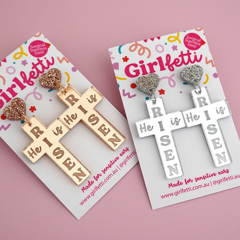 Rose gold and silver mirror acrylic Easter cross dangle earrings with 'He is Risen' engraved on back
