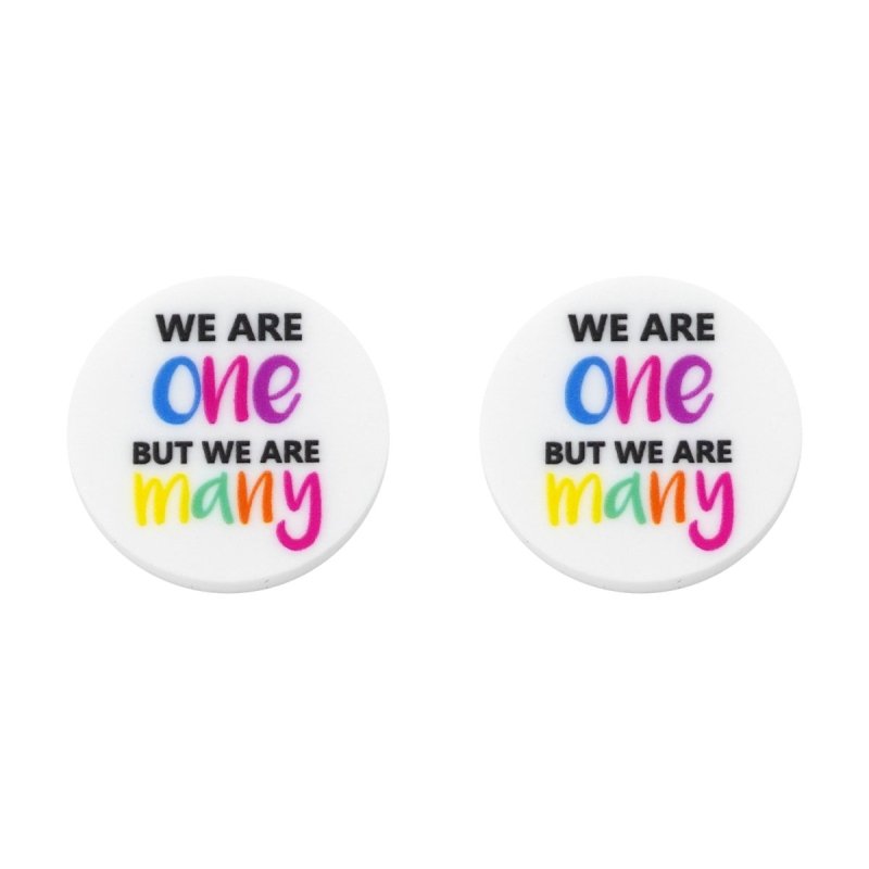 A pair of teacher acrylic statement studs with 'we are one but we are many' printed on for Harmony Day